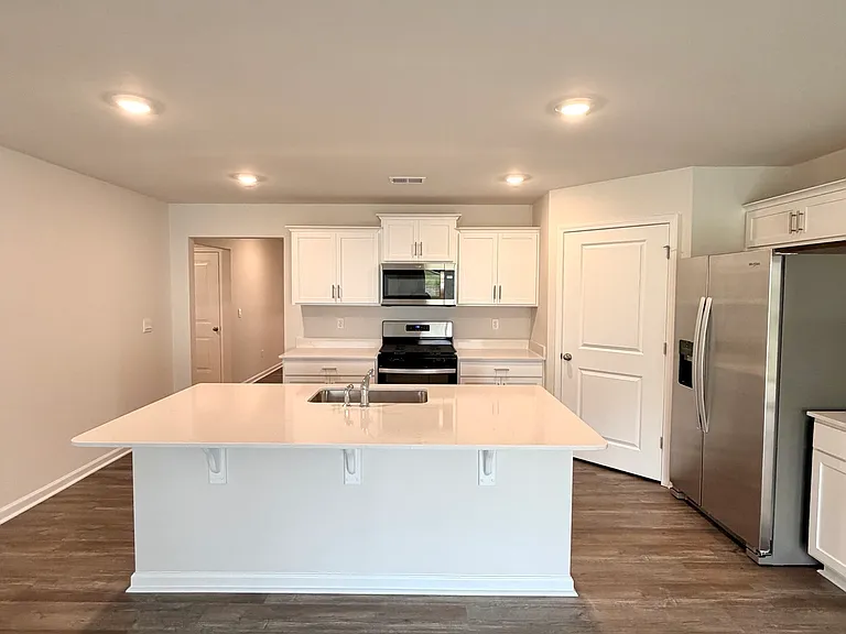 Large kitchen features a kitchen island