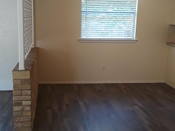 Dining room with wrought iron partition