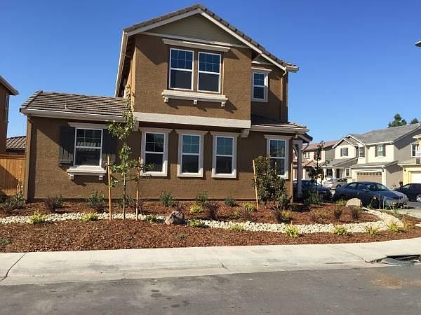 The property located around corner. There is a lot of parking space.