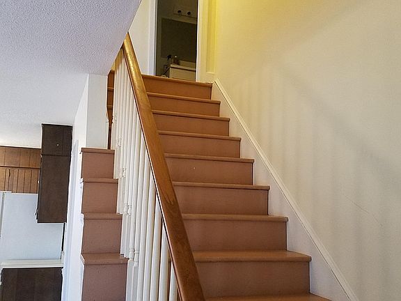 stairway to 2 large bedrooms upstairs