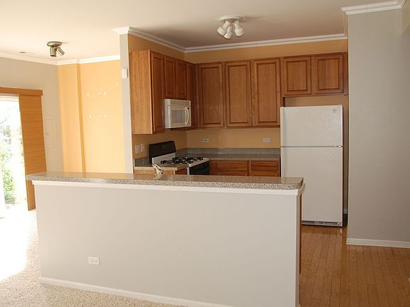 Kitchen open to Living area and Dining area