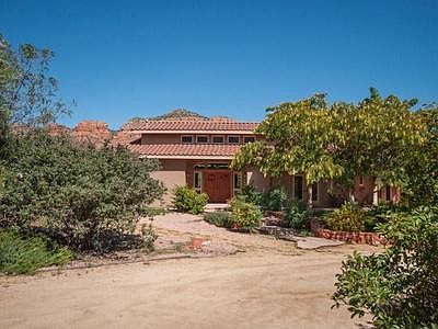 View of the front of the home from private driveway.