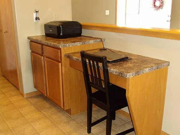 Built-in office space off of garage entry hallway