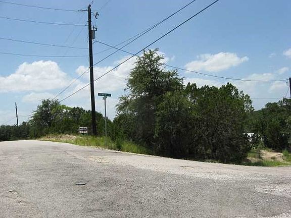 Lot has slight slope allowing for 2 story construction