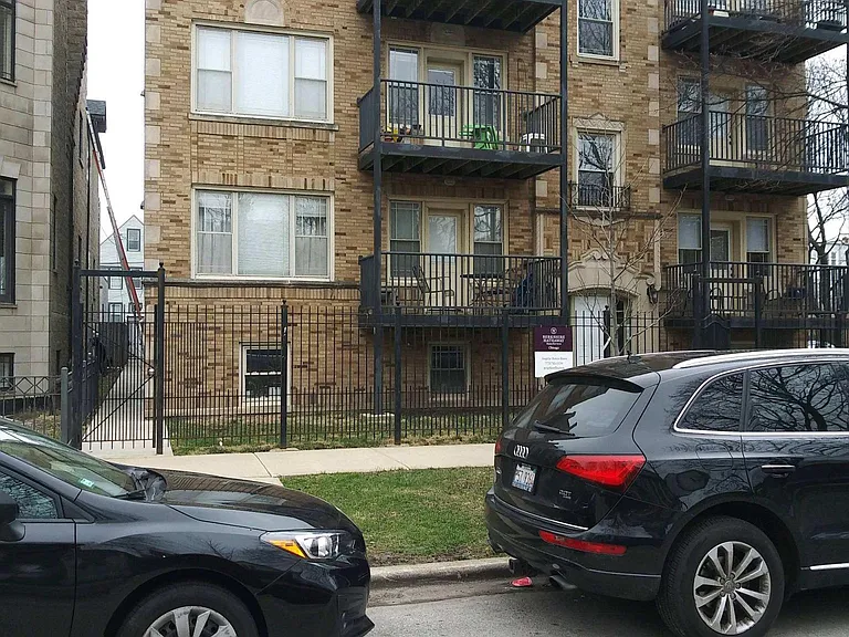 4203 N Lawndale. Front of the building. Balcony on the 3rd floor / left