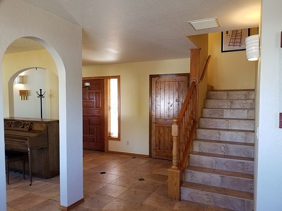 Staircase leads to loft.