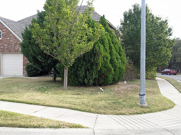 Corner lot with long driveway for ample parking