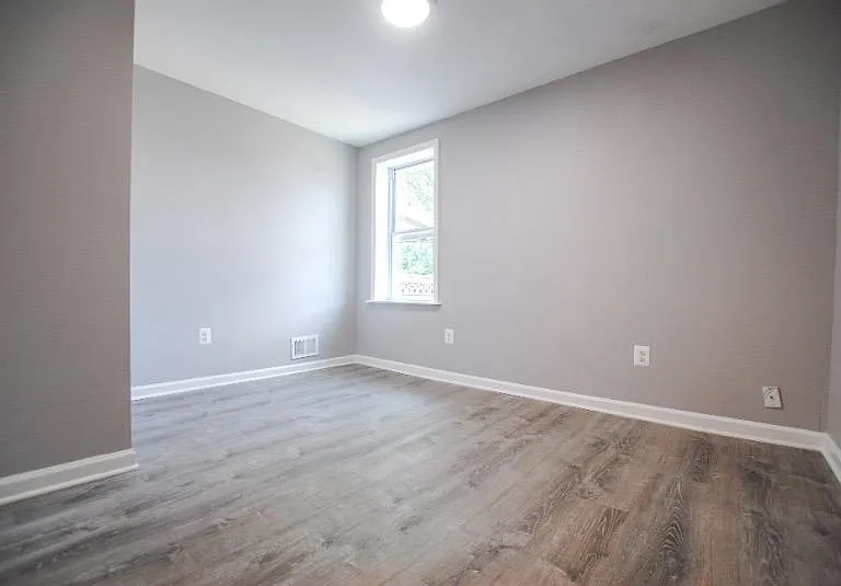 Head upstairs to find 2 bedrooms, a den, and bathroom