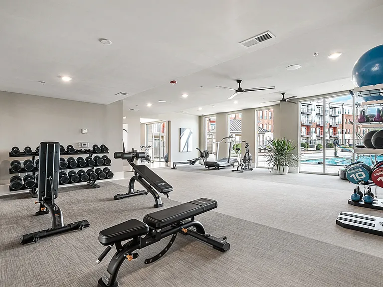 Wellness Center with Free Weights and Strength Training Equipment