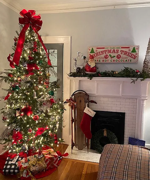 Another view of living room and french door leading to sunroom at Christmas time!