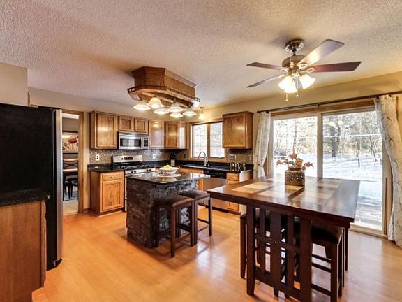 Light and bright kitchen with loads of counter and cabinet space.