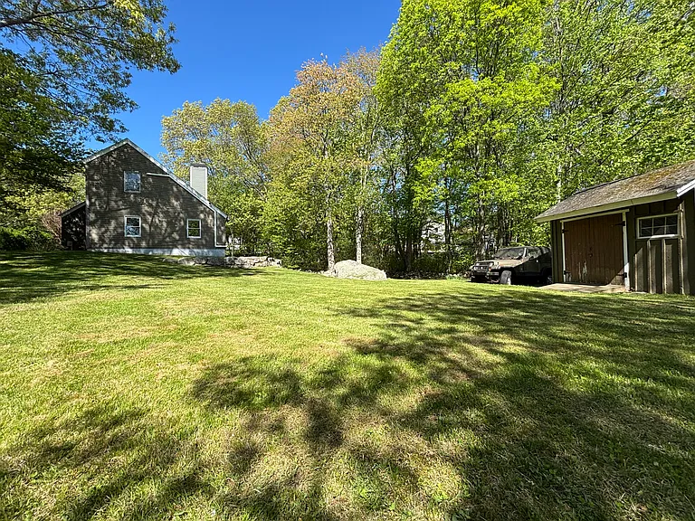 Standing In Side Yard Looking Towards Backyard