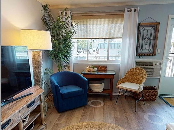 Living Room Window to porch and 144th Street