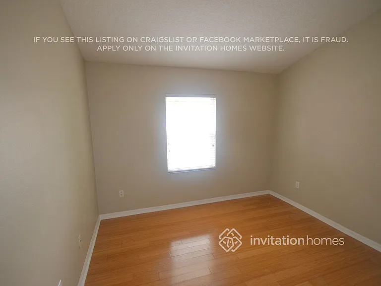 4704 Whispering Wind Ave — Photo 12