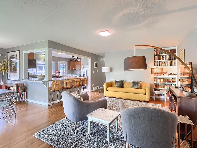 Main Floor Living Room with view into kitchen