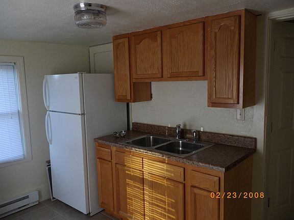 Kitchen sink and refrigerator. Stove also included.
