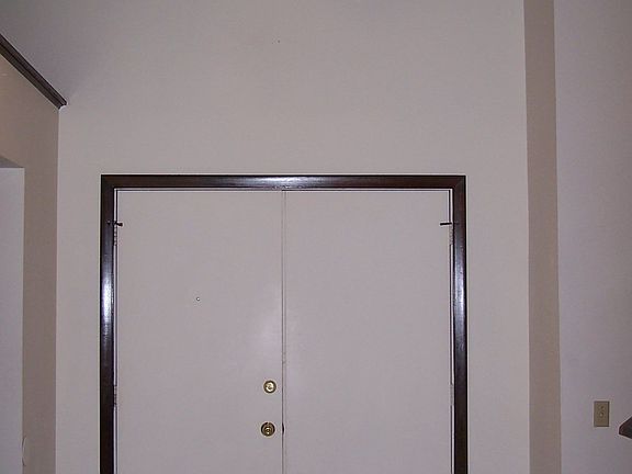 Double Front Entry Doors with ceramic tile