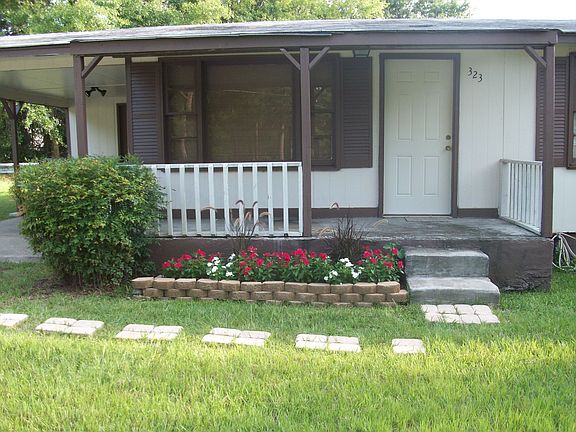 Front porch with flower bed