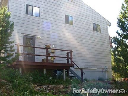 Side Of House/East Side
						:
						Square porch perfect for outdoor dinners and just enough sun for perfect flowers