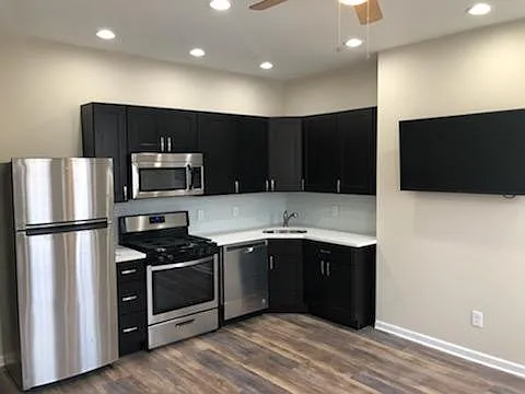 Building Photo - 4918 Warrington Ave #2