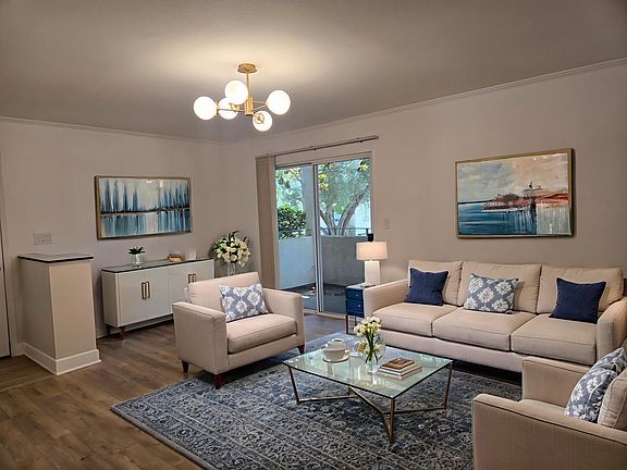 Livingroom (in another angle) is virtually staged