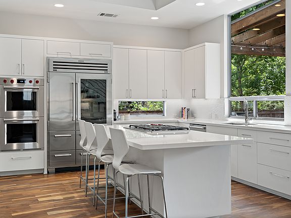 This gorgeous eat-in kitchen is the center of the home