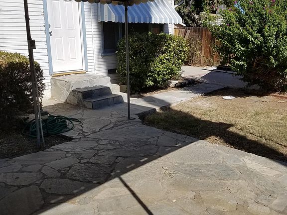 Back patio and Bedroom 2 back door view