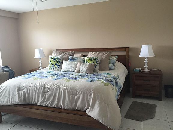 Master bedroom with king sleeper and walk-in closet and priv