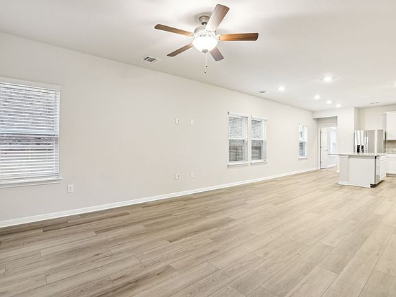 Bring together family and friends in this open concept floorplan.