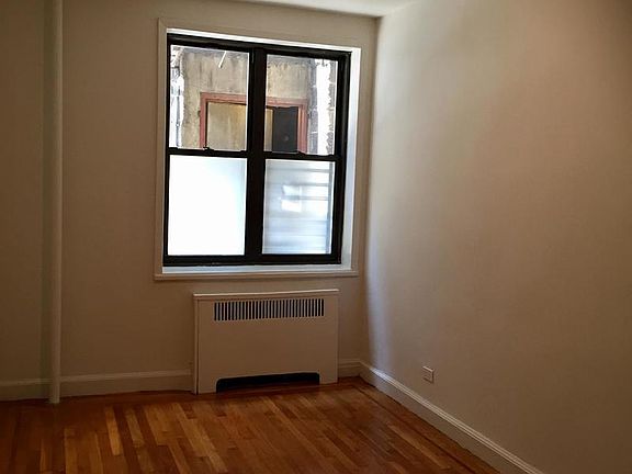 3rd image of 8 E 48th St APT 2C