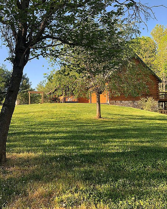 Log Home on a Hill