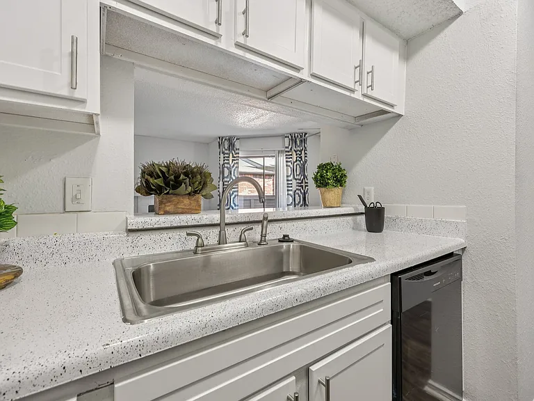 Modern White Kitchen with Ample Cabinet Space