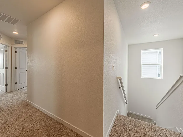 Top of stairs looking towards bedrooms