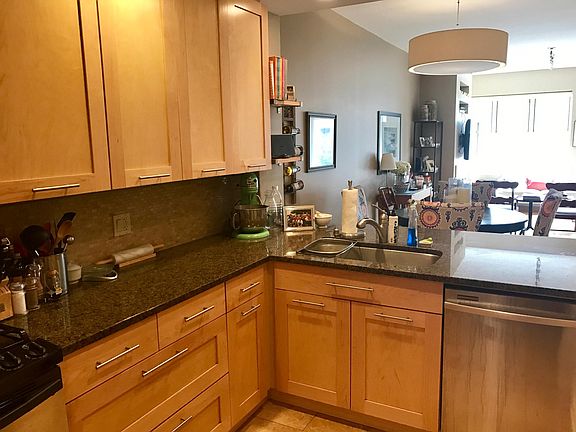 Remodeled kitchen with Bosch dishwasher, granite counters, t