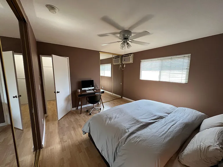 Please note: Pre-renovation photo shown for layout reference. Brand-new flooring has since been installed.