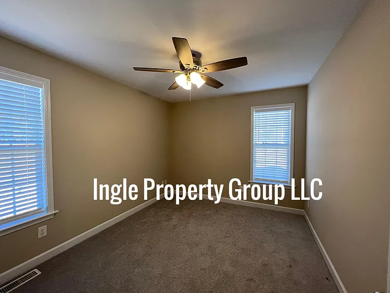 3rd bedroom- freshly painted, new carpet , new fan