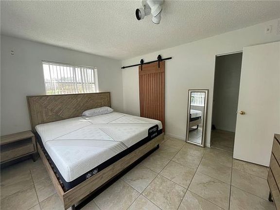 2nd image of 8750 N Sherman Cir #20H