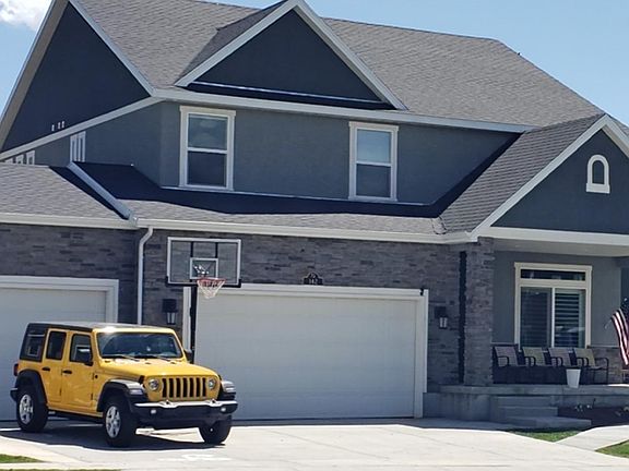 Beautiful stone & stucco home, 3 car garage.