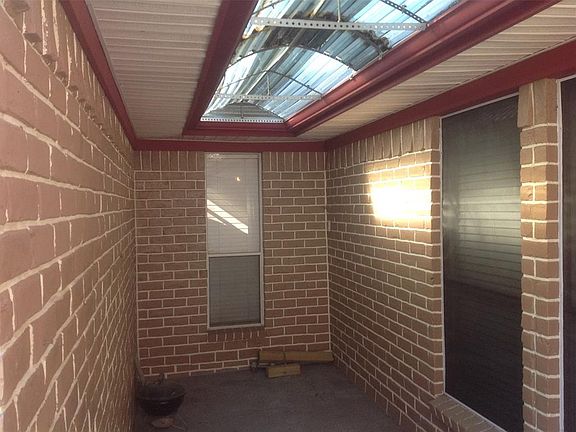 There's also an extended porch to the left of the front door that provides a covered place to be outdoors comfortably.