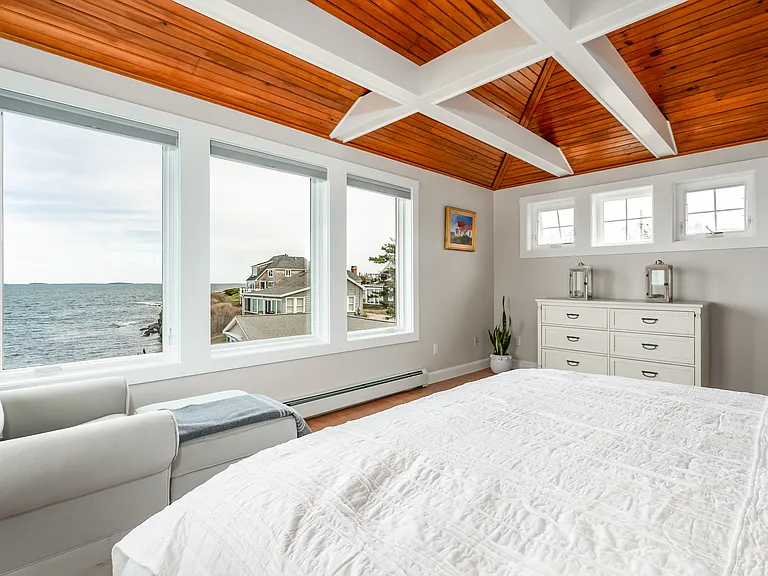 The third floor master bedroom with a king bed. Panoramic ocean views.