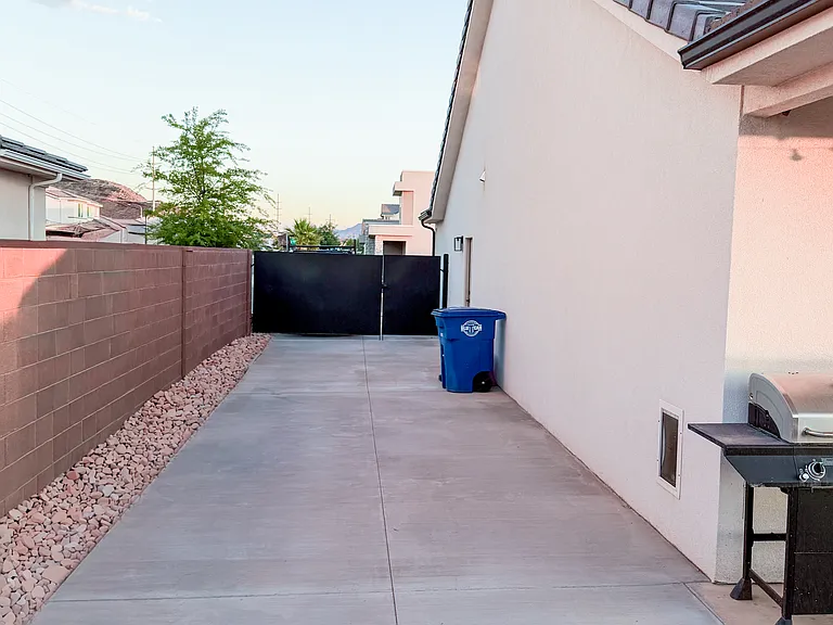 Side yard with concrete and gate