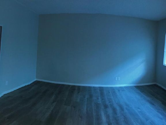 Spacious living room with plenty of light