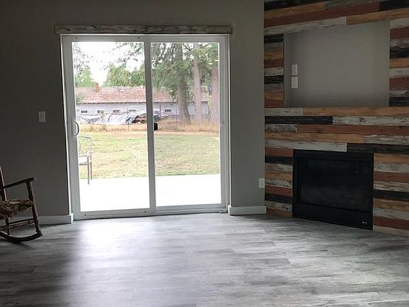 Living Room/Backyard faces Anderson Island Outdoor Stage for enjoying summer concerts.