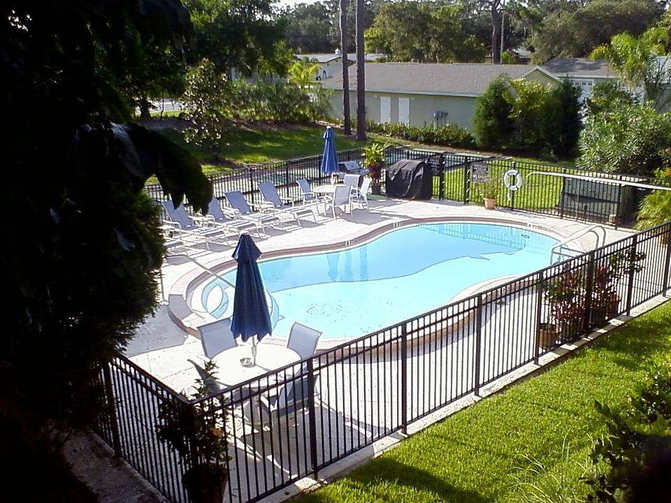 view of pool from front patio