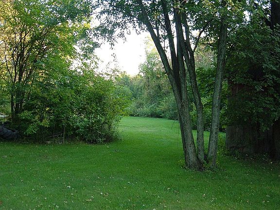 Large wooded 1.54 acre lot