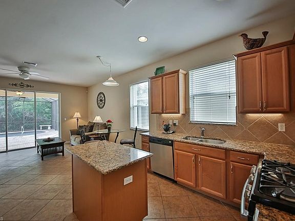 Spacious Kitchen ~ Great Room ~ Opens to Lanai