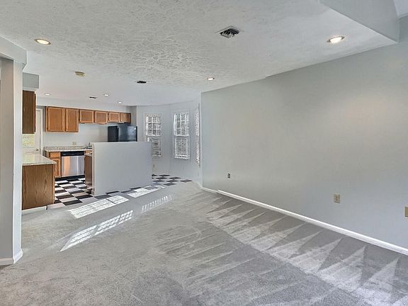 Open dining and living area adjacent to Kitchen.