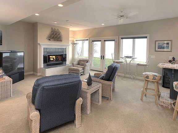 Family Room Lower Level Walkout-Wet Bar
						:
						Bar Seats Six
Wine Cooler-Dishwasher
Fireplace
Bayview
Plush Beige Carpet