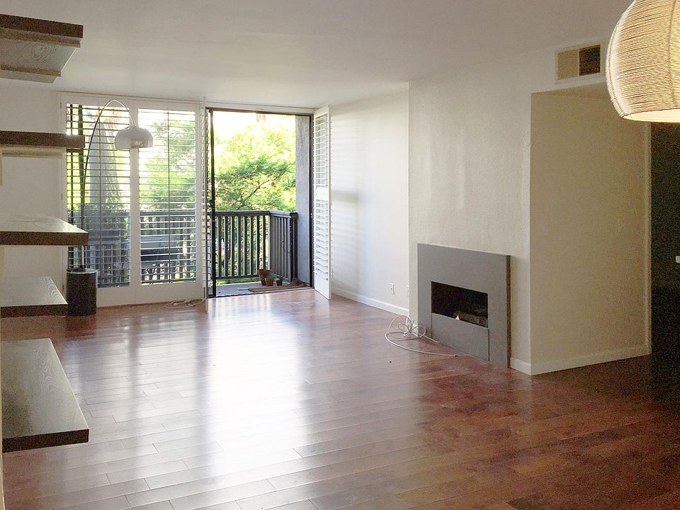 West facing, living room looking out to Alta Loma