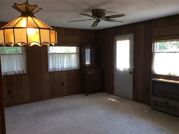 Super nice family room opens to the dining room. Door leads to the deck/yard.